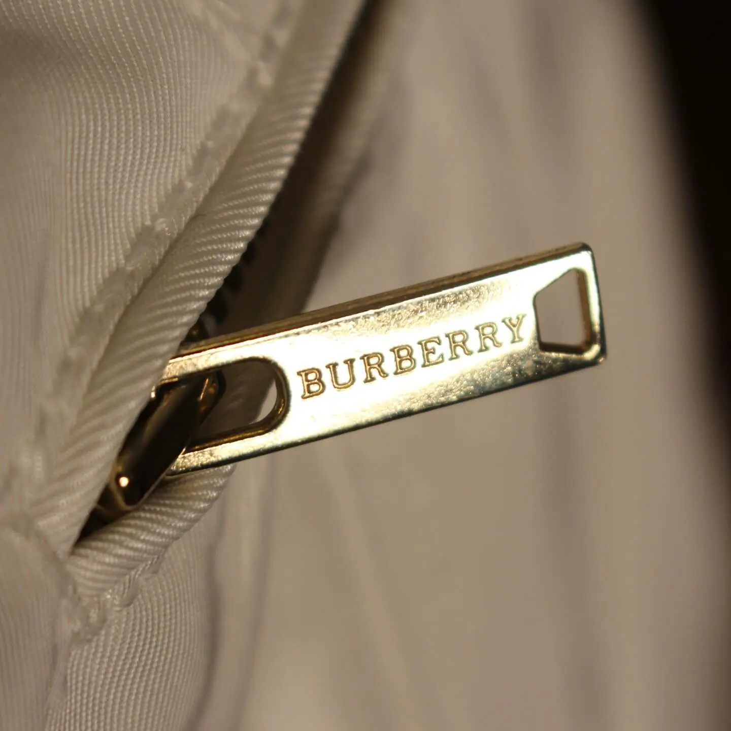 White Burberry women’s zippered down jacket, belted waist, view 7 of 11